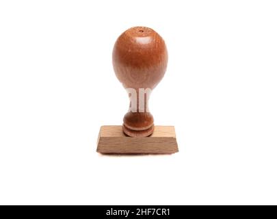 Holzstempel isolierter Ausschnitt auf weißem Hintergrund, Designelement. Staubgefäß aus Holz und Gummiauflage für offizielle Papiere Stockfoto