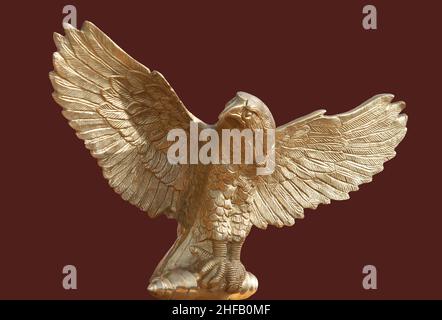Aquila, ein Adlerstück, das im antiken Rom als Standard einer Legion verwendet wurde. Isoliert auf rotem Hintergrund Stockfoto