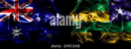 Flaggen von Australien, Australien vs. Brasilien, Brasilien, Sergipe. Rauchfahne nebeneinander auf schwarzem Hintergrund platziert. Stockfoto