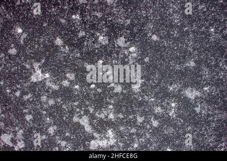 Weiße Flecken auf schwarzem Hintergrund. Textur. Stockfoto