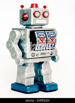 Retro-Roboter-Spielzeug auf weißem Hintergrund Stockfoto