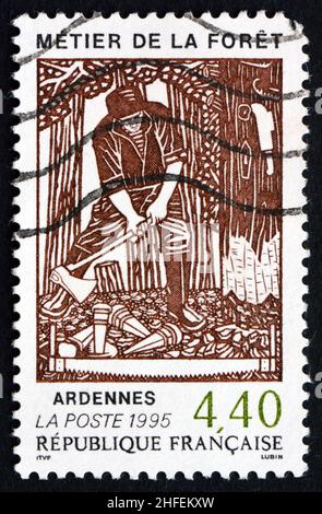 FRANKREICH - UM 1995: Eine in Frankreich gedruckte Briefmarke zeigt den Beruf des Forstwesens, Ardennen, um 1995 Stockfoto