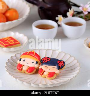 Bandung, Indonesien, 01 12 2021: Chinesisches Neujahr Imlek Puderzucker-Kekse Charakter. Das chinesische Schriftzeichen ist „Chun“ und bedeutet Frühling. Stockfoto