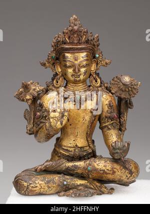 Bodhisattva Avalokiteshvara sitzend mit der Hand in Geste der Beruhigung (Abhayamudra), 15th/16th Jahrhundert. Stockfoto