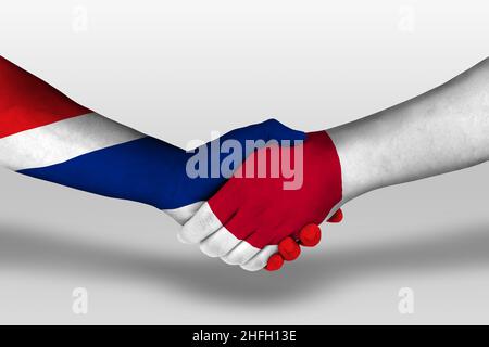 Handschlag zwischen japan und thailand Flaggen auf Händen gemalt, Illustration mit Clipping Path. Stockfoto