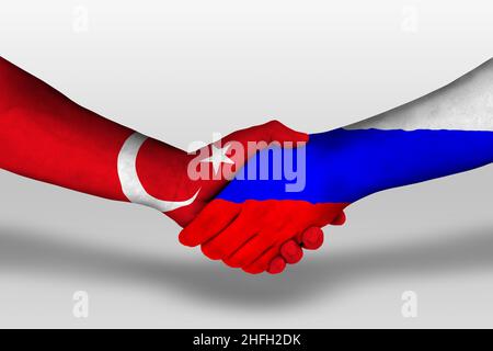 Handschlag zwischen russland und der türkei Flaggen auf Händen gemalt, Illustration mit Schneideweg. Stockfoto