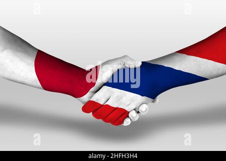 Handschlag zwischen thailand und japan Flaggen auf Händen gemalt, Illustration mit Schneideweg. Stockfoto