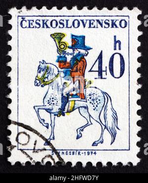 Tschechoslowakei - CIRCA 1974: eine Briefmarke gedruckt in der Tschechoslowakei zeigt Post Reiter, ca. 1974 Stockfoto