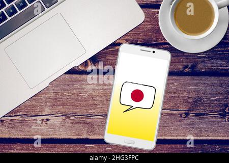 Ein Smartphone und Japanisch lernen Stockfoto