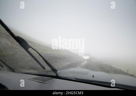View from within a car that drives the Abano pass in Tusheti, one of the most dangerous roads in the world. Stockfoto