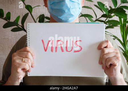 Das Konzept der Prävention von Krankheiten durch Viruserkrankungen. Ein Zeichen, das Virus sagt. Stockfoto
