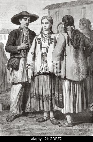 Bauern und Frauen in den typischen Kostümen der Umgebung von Agram, Kroatien, Europa gekleidet. Alte, gravierte Illustration aus dem 19th. Jahrhundert von der Reise zu den Südslawen von Georges Perrot, Le Tour du Monde 1870 Stockfoto