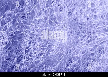 Nahaufnahme von lila gestrickten strukturierten Hintergrund. Stockfoto