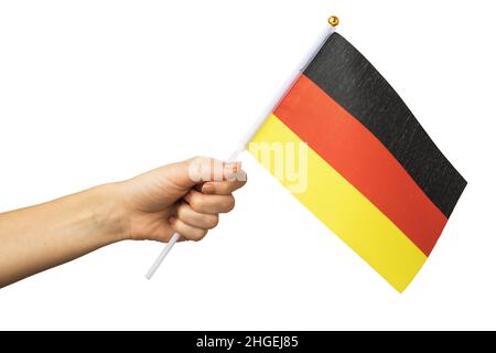 Weibliche Hand hält Deutschland Flagge isoliert auf weißem Hintergrund, Vorlage für Designer Stockfoto