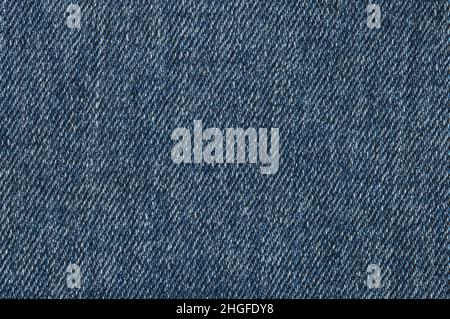 Blaue Jeans Hintergrund und Textur. Nahaufnahme von blauen Jeans Hintergrund. Denim-Struktur. Stockfoto