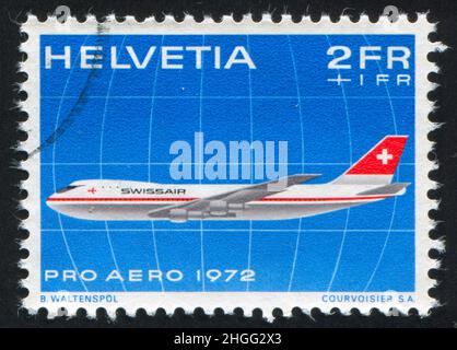 SCHWEIZ - UM 1972: Briefmarke gedruckt von der Schweiz, zeigt Boeing 747, um 1972 Stockfoto