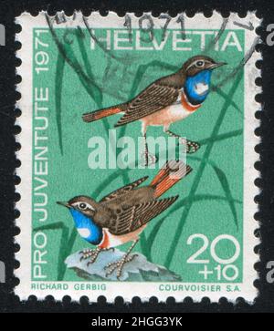 SCHWEIZ - UM 1970: Briefmarke gedruckt von der Schweiz, zeigt Vogel, um 1970. Stockfoto