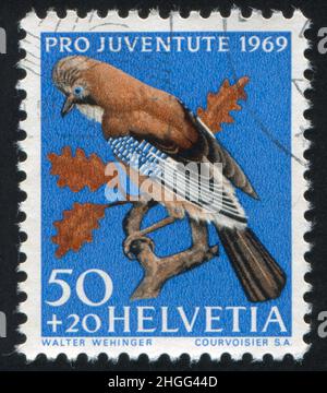 SCHWEIZ - UM 1968: Briefmarke gedruckt von der Schweiz, zeigt Vogel, um 1968. Stockfoto