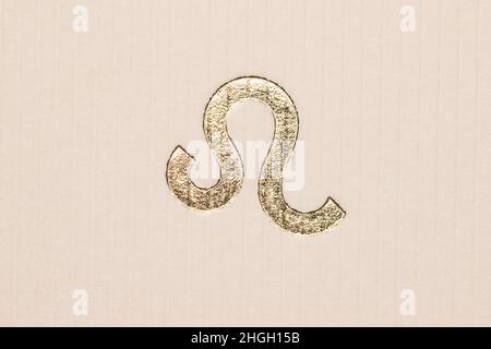 Nahaufnahme Horoskop Zeichen des Tierkreises Symbol in Blattgold, die das Sternbild Löwe Stockfoto