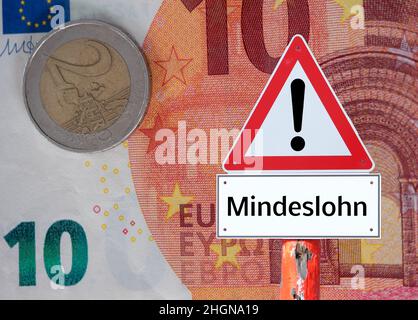 Warnschild Mindestlohn in Deutschland Stockfoto
