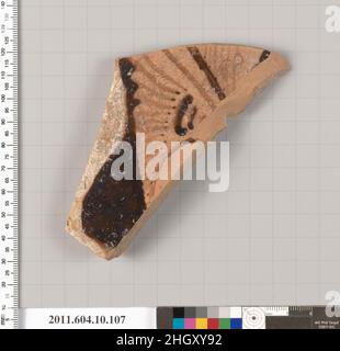 Terrakotta-Fragment eines Kraters (tiefe Schale) 4th Jahrhundert v. Chr. Etrusker, Faliscan Teil einer Palmette. Terrakotta-Fragment eines Kraters (tiefe Schale). Etrusker, Faliscan. 4th Jahrhundert v. Chr.. Terrakotta; rote Figur. Klassisch. Vasen Stockfoto