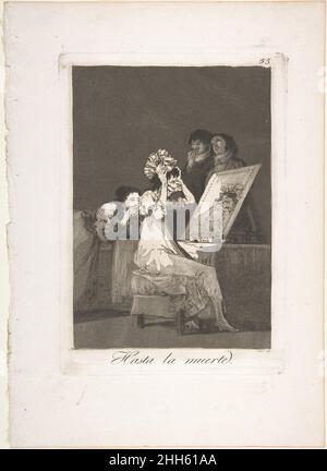 Tafel 55 aus 'Los Caprichos': Bis zum Tod' (Hasta la muerte.) 1799 Goya (Francisco de Goya y Lucientes) Spanisch die Figur in der Mitte wurde verschiedentlich als eitle Frau identifiziert, die sich bereit macht, ihren 75. Geburtstag zu feiern, oder als Darstellung des Todes selbst. Sie sitzt am Spiegel in ihrem Boudoir und versucht ein neues Kopfstück, während ihre Magd und zwei junge Männer – möglicherweise ihre bekennenden Bewunderer – ihren Spott verbergen. Das Bild teilt den Ton und die Sorgen der sozialen Satiren, die früher in der Serie auftreten. Seine Position könnte durch das physische Aussehen der alten Frau erklärt werden; Th Stockfoto