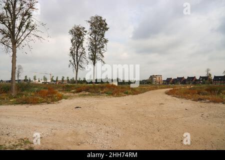 Sand und Treibsand auf Feldern, auf denen ein neues Wohnviertel entstehen wird. Stockfoto