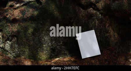 Leeres Buchmockup auf Vegetation platziert, Notizbuch-Mockup. Mockup auf Naturhintergrund 04 Stockfoto