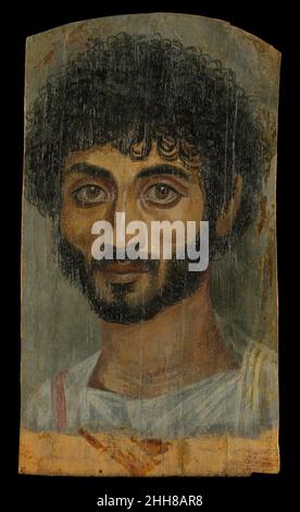 Porträt eines dünngesichtigen, bärtigen Mannes 160–180 Römerzeit der Begriff Enkaustik bezeichnet Malerei, in der Bienenwachs mit Pigmenten vermischt wird. Die Technik wurde erstmals von griechischen Malern des fünften und vierten Jahrhunderts v. Chr. verwendet.Alte Beschreibungen sind schwer zu interpretieren, und ägyptische Mumie-Porträts - die einzigen Werke im Medium, die aus der Antike stammen - wurden noch nicht ausführlich analysiert. Daher bleiben viele Fragen hinsichtlich der Details der Techniken, die von Mumien-Portraitmalern verwendet werden, offen, obwohl die Arbeit einiger weniger Gelehrter und moderner Künstler, die in enkaustischer Malerei arbeiten, PR hat Stockfoto