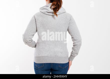 Hübsche Frau im grauen Kapuzenpullover-Mockup - Rückansicht Stockfoto