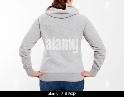 Hübsche Frau im grauen Kapuzenpullover-Mockup - Rückansicht Stockfoto