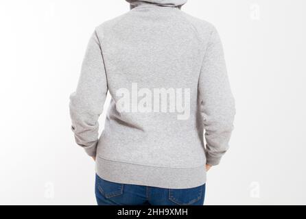 Rückansicht einer Frau in einem Kapuzenpullover isoliert, vorne Stockfoto