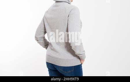 Hübsche Frau im grauen Kapuzenpullover-Mockup - Rückansicht Stockfoto