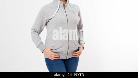 Frau in grauem Kapuzenpullover Mockup - blank Stockfoto