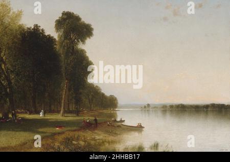 Sommertag am Conesus Lake 1870 John Frederick Kensett Amerikaner der Conesus Lake, der kleinste und westlichste der elf Finger Lakes des Staates New York, war ein beliebter Sommerort, der von Kensett häufig besucht wurde, um mit Robert M. Olyfhang, einem seiner glühenden Freunde und Förderer, Kontakt aufzunehmen. Die dort ein Zuhause besaßen. Die Darstellung der Szene, ein Kontrapunkt aus Seenoberfläche und Liegerad, das hoch aufragende Bäume stützt, schafft eine klassische Bühne, die sich für die vornehme Party eignet – Bootfahren, Picknicken, Promenaden oder einfach nur Entspannen – in und aus den Hainen, die das Ufer schützen. Kensetts künstlerische Arbeit Stockfoto