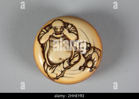 Netsuke von Hotei und Chinese Boy (Karako) Japan des 19th. Jahrhunderts. Netsuke von Hotei und Chinese Boy (Karako) 60312 Stockfoto