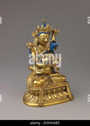 Die buddhistische Gottheit Vajradhara in Vereinigung mit seiner Gemahlin Prajnaparamita 1403–24 wahrscheinlich chinesisch oder tibetisch. Die buddhistische Gottheit Vajradhara in Vereinigung mit seiner Gemahlin Prajnaparamita. Wahrscheinlich chinesisch oder tibetisch. 1403–24. Vergoldetes Messing mit Kupfersockel und aufgetragene Farbe. Metallverarbeitung Stockfoto