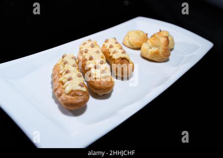 eclair french Gebäck Biskuitkuchen Stockfoto