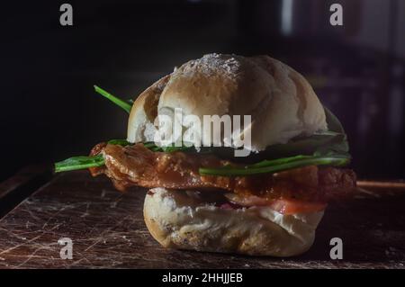 Gefüllte Schweinebandwiches, genannt PORCHETTA in italienischer Sprache, zum Verkauf an der Street Food Stall. Stockfoto