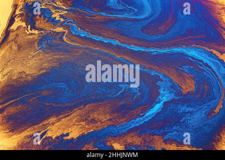 Mischung von blauen und orangenen flüssigen Marmorölfarben abstrakt strukturierten Hintergrund Stockfoto