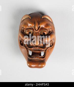 Netsuke of Noh Mask: Hannya 19th Century Japan. Netsuke of Noh Mask: Hannya. Japan. 19th Jahrhundert. Holz. Edo (1615–1868) oder Meiji-Periode (1868–1912). Netsuke Stockfoto