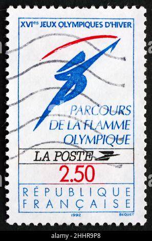 FRANKREICH - UM 1991: Eine in Frankreich gedruckte Marke zeigt Olympic Flame, Olympische Winterspiele 1992, Albertville, um 1991 Stockfoto