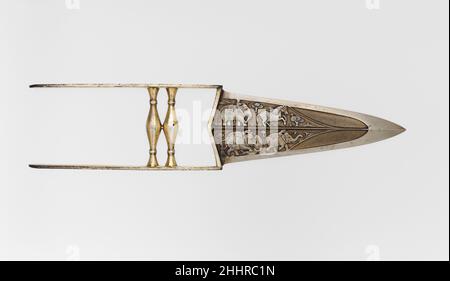 Punch Dagger (Katar) mit Sheath Ende 17th–18th Jahrhundert indischen, Mughal Dolche dieser alten indischen Typ sind verschieden als Katar (stechende Dolch) oder Jamadhar (Todeszahn) bekannt. In der Faust ergriffen, sollten sie einen tödlichen Schlag abliefern und wurden sowohl im Krieg als auch bei der Jagd eingesetzt. Die Klinge dieses Beispiels zeichnet sich durch die zart gemeißelten Figuren von Elefanten und Pferden aus, die auf der Jagd sind. Schlagdolch (Katar) mit Mantel 31505 Stockfoto