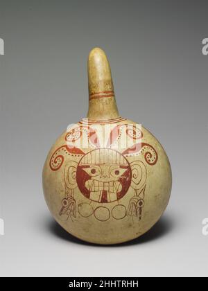 Dipper 3rd–5th Century Moche Moche Maispflücker, oder Dippers, haben einen linsenförmigen Körper und einen an einer Seite befestigten Griff. Während einige Griffe eine hornartige Form haben, haben die meisten einen menschlichen oder tierischen Kopf an den Extremitäten. Die Form dieser Gefäße wurde vielleicht von ähnlichen Behältern aus Flaschentürze abgeleitet. Cornpoppers sind selten in häuslichen Kontexten zu finden. Sie wurden als Grabbeigaben und wahrscheinlich als Trinkgefäße während Ritualen verwendet. In geräumigen Räumen auf der monumentalen Plattform bei Huancaco im Virú-Tal wurden viele Korntöpfe entdeckt. Sie wurden mit großen Gläsern de assoziiert Stockfoto