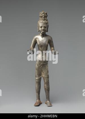 Stehender Bodhisattva Maitreya, der Buddha der Zukunft 8th Jahrhundert Thailand (Buriram Provinz, Prakhon Chai). Stehender Bodhisattva Maitreya, der Buddha der Zukunft 39196 Stockfoto