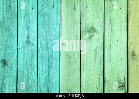 Mehrfarbiger blauer, grüner und gelber Holzkachelhintergrund Stockfoto