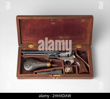 Colt Modell 1851 Navy Percussion Revolver, Seriennummer 29705, mit Gehäuse und Zubehör ca. 1853–54 Samuel Colt der Amerikaner Gustave Young (1827–1895), ein in Deutschland geborener Handwerker, gravierte Feuerwaffen mit komplizierten und aufwendigen Ornamenten für Colt in Hartford, Connecticut, und Smith & Wesson in Springfield, Massachusetts. Sein posthume Ruhm unter Waffensammlern führte dazu, dass die Dekoration vieler Stücke seiner Hand falsch zugeschrieben wurde. Als eines der wenigen dokumentierten Beispiele von Youngs Arbeit ist diese Pistole daher von primärer Bedeutung als Prüfstein für das Verständnis seines Stils und seiner Technik. Colt M Stockfoto