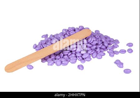 Aromatherapie violett Lavendel Wachs Tropfen für Enthaarung isoliert auf dem weißen Stockfoto