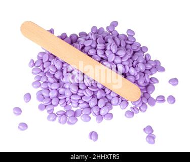 Aromatherapie violett Lavendel Wachs Tropfen für Enthaarung isoliert auf dem weißen Stockfoto