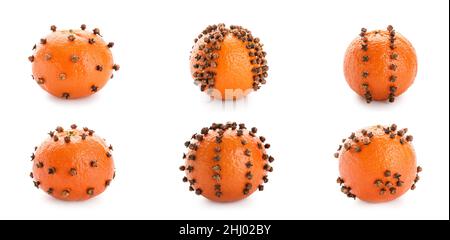 Set aus orangefarbenen Pomanderkugeln auf weißem Hintergrund Stockfoto